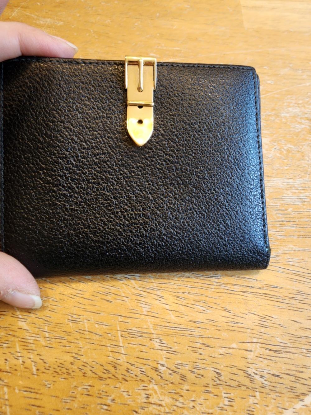vintage Gucci black textured leather compact bifold wallet